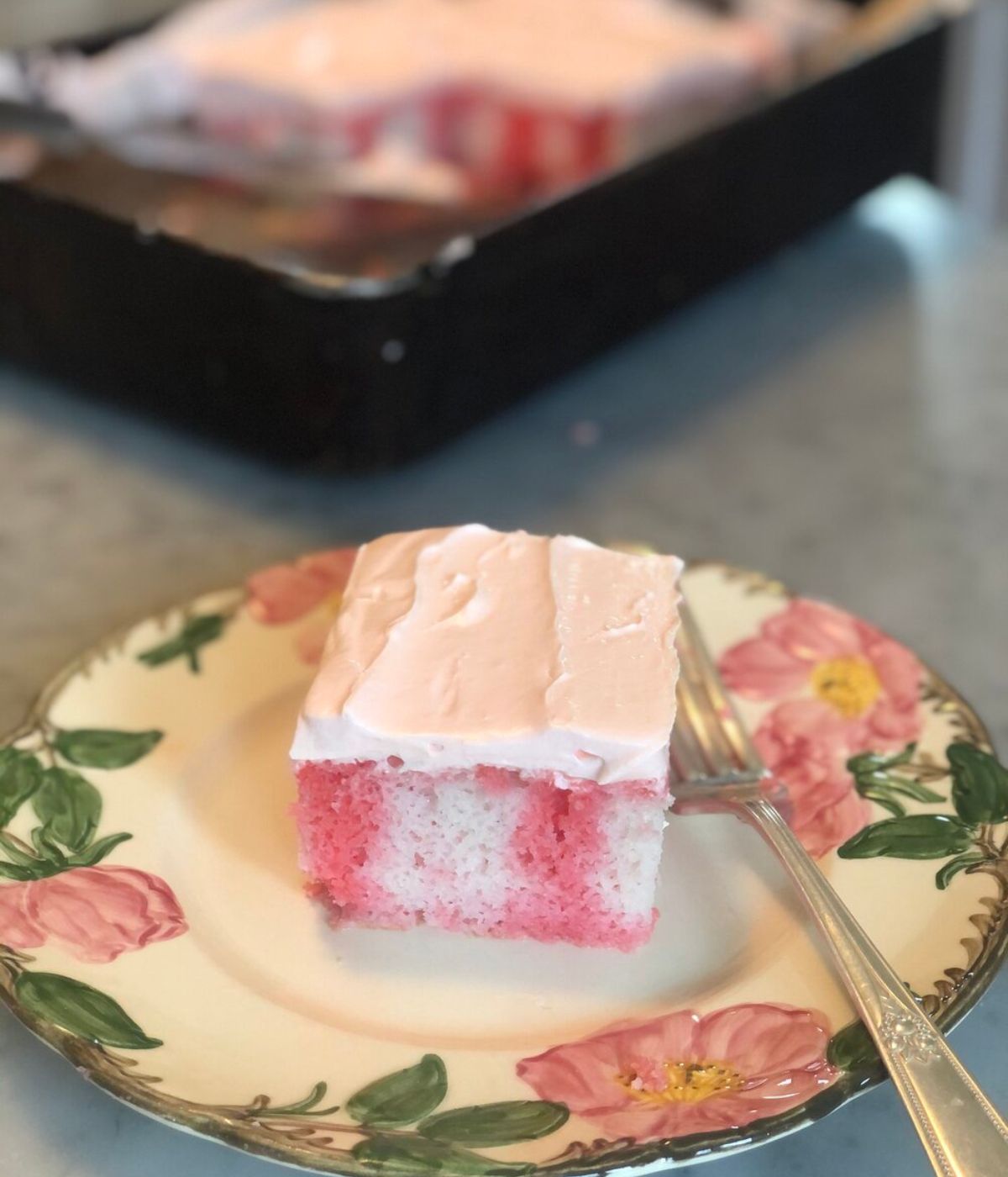 a slice of strawberry pop cake